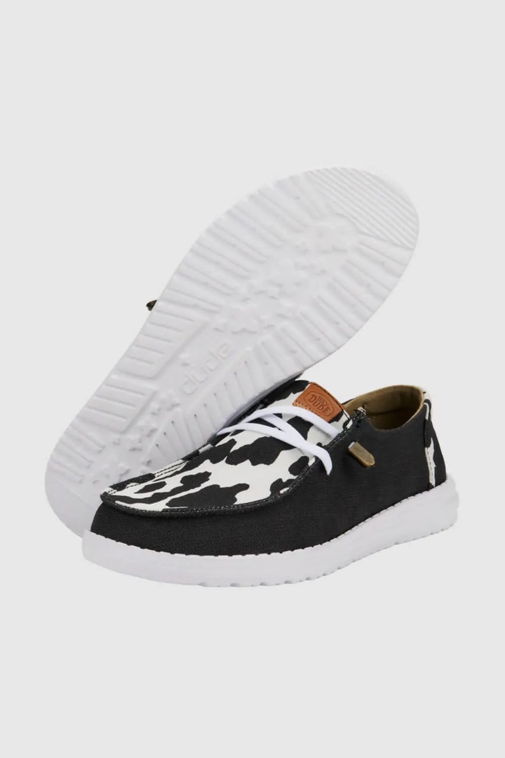 HEYDUDE Women’s Wendy Cow Print Shoes in Black/White | 41037-0HO
