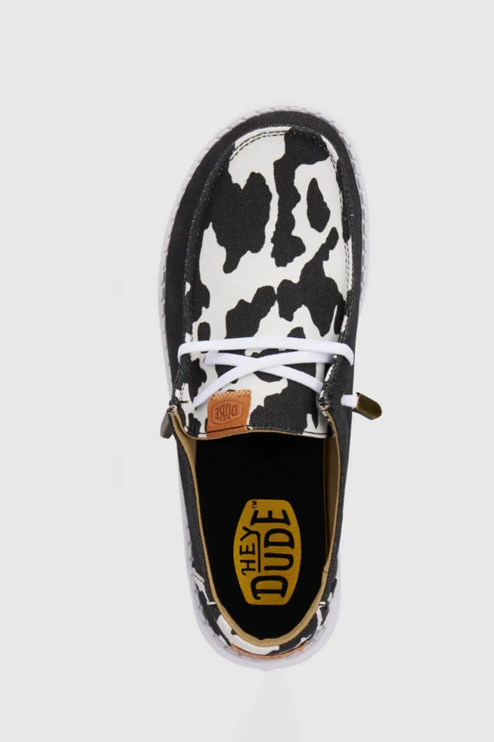 HEYDUDE Women’s Wendy Cow Print Shoes in Black/White | 41037-0HO