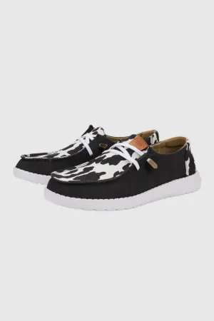 HEYDUDE Women’s Wendy Cow Print Shoes in Black/White | 41037-0HO