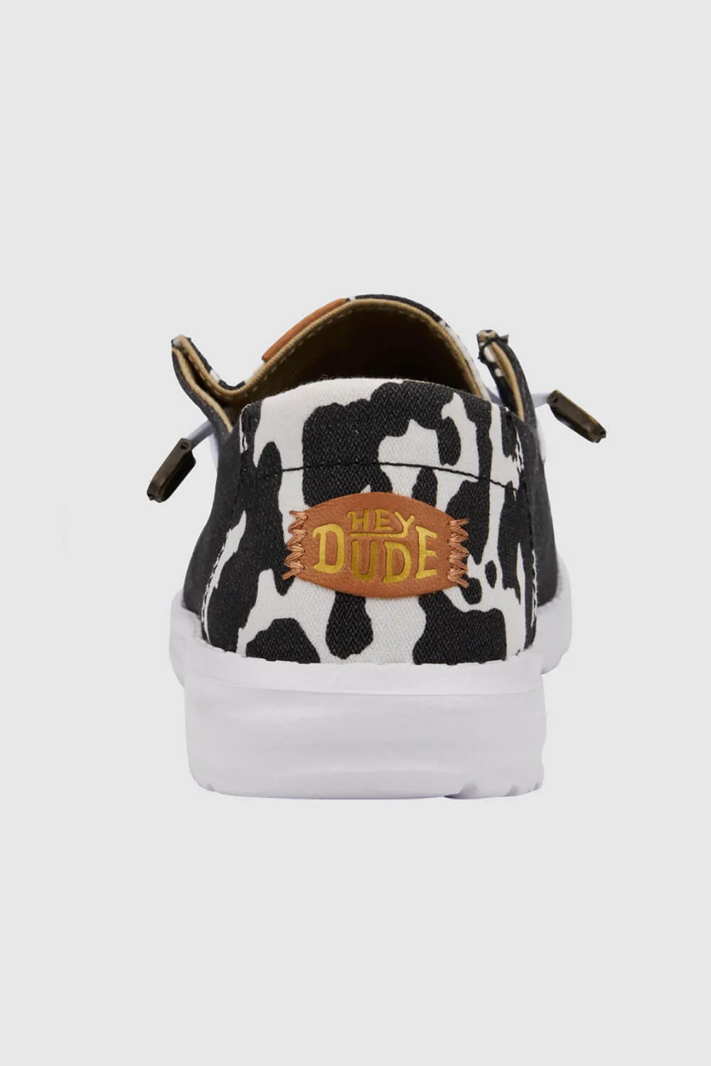 HEYDUDE Women’s Wendy Cow Print Shoes in Black/White | 41037-0HO