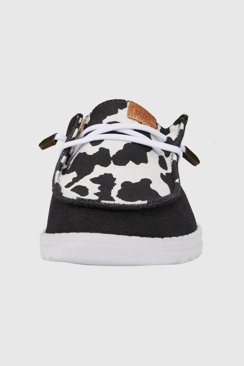 HEYDUDE Women’s Wendy Cow Print Shoes in Black/White | 41037-0HO