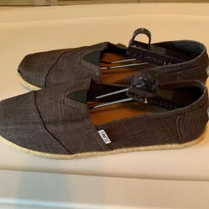 Men's size 12 Toms dark gray with canvas roping NEW
