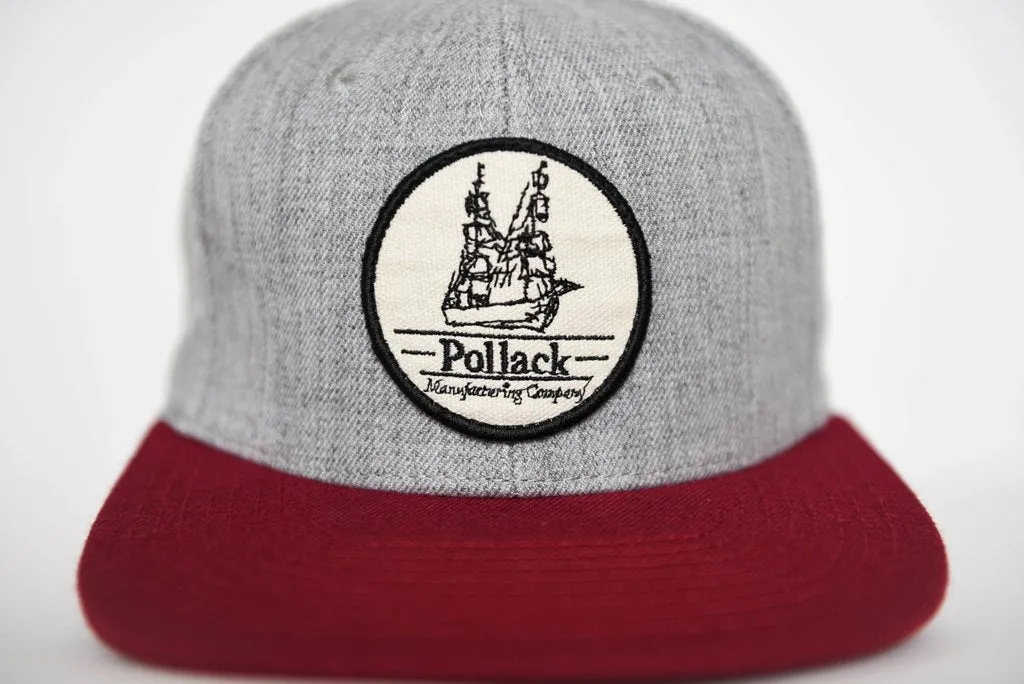 RED BRIM SNAPBACK